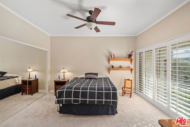 bedroom featuring carpet, ceiling fan, and ornamental molding