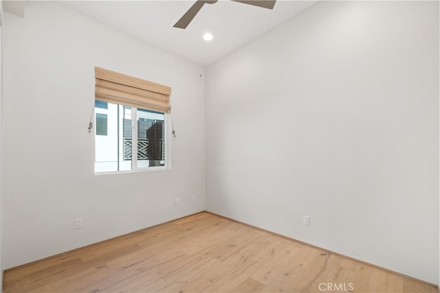 empty room featuring light hardwood / wood-style floors and ceiling fan