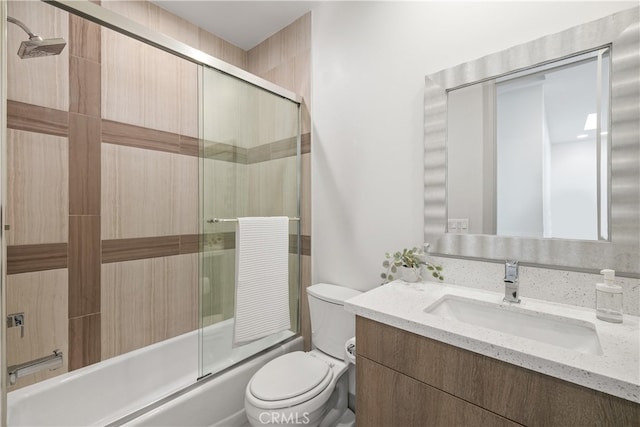 full bathroom featuring vanity, toilet, and enclosed tub / shower combo