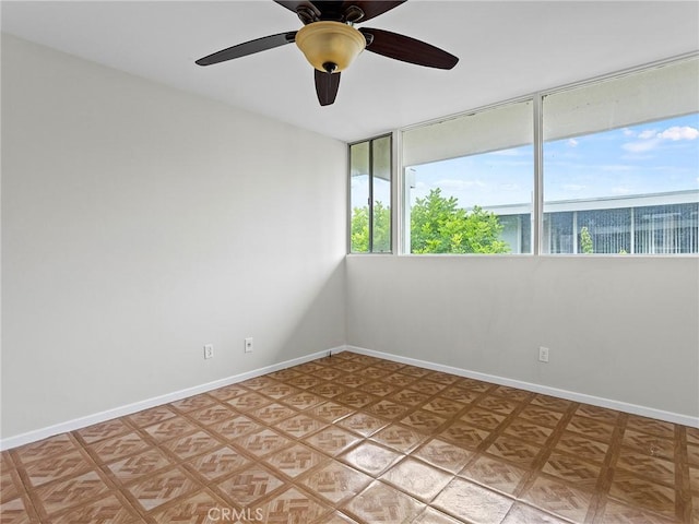 spare room featuring ceiling fan