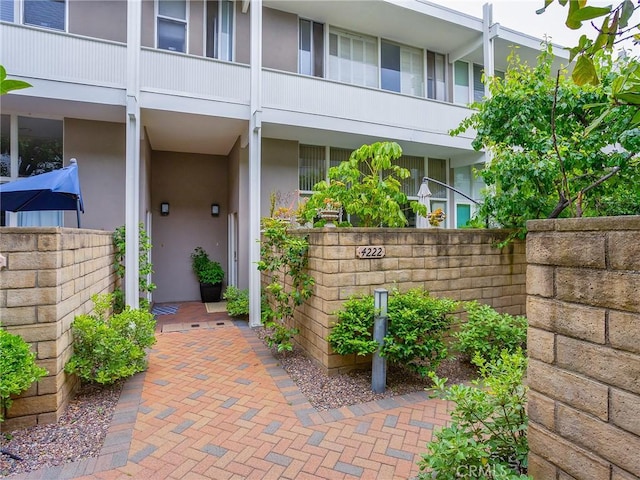 doorway to property with a balcony