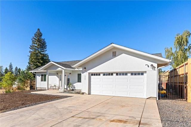 ranch-style home with a garage