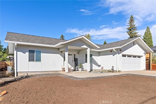 single story home featuring a garage