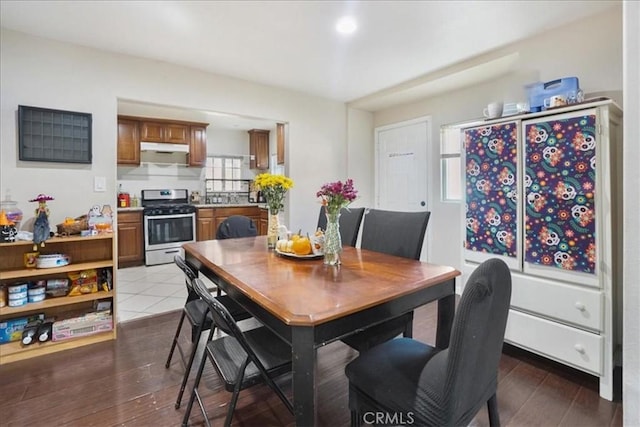 dining area with light wood-type flooring