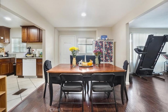 dining area with light hardwood / wood-style flooring