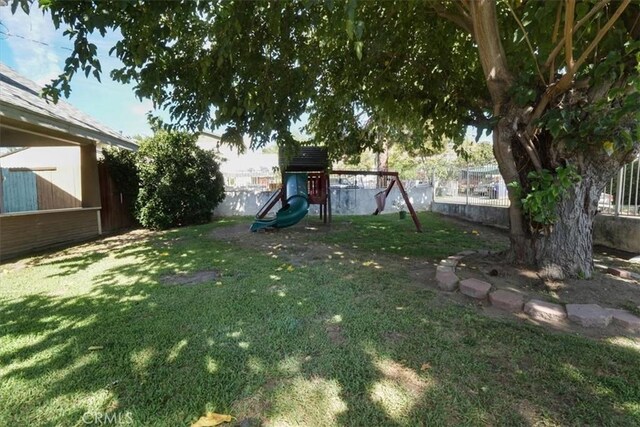 view of yard with a playground