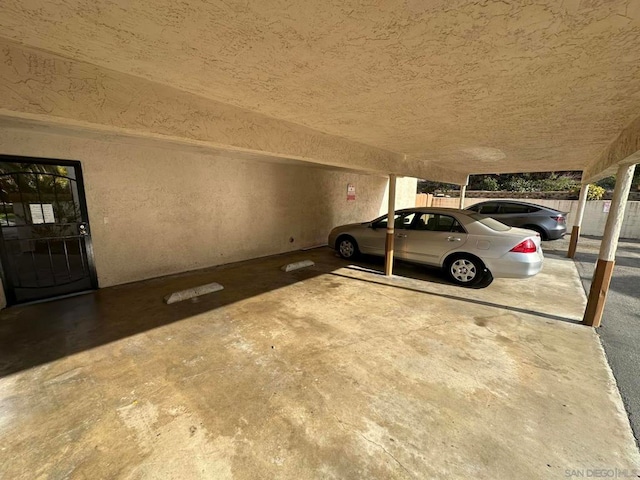 view of parking with a carport