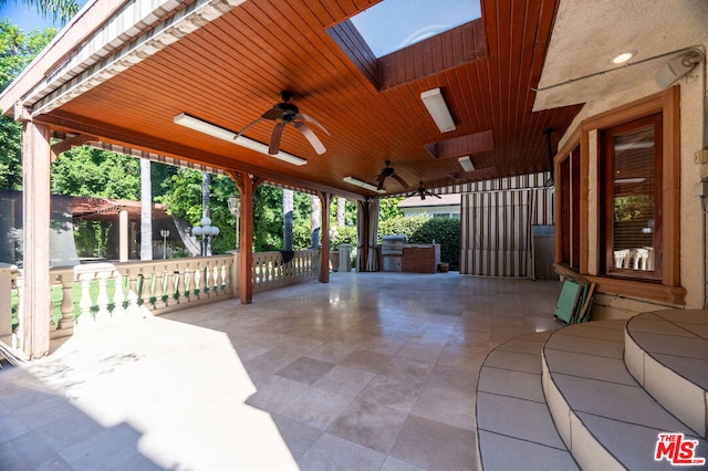 view of patio with ceiling fan