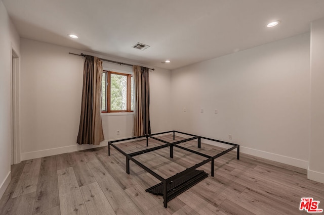 unfurnished bedroom featuring light hardwood / wood-style floors