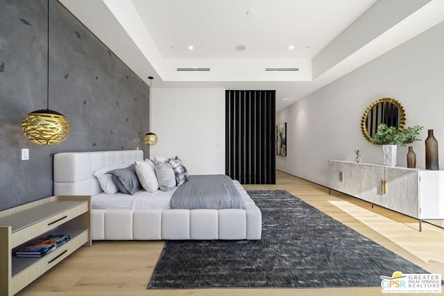 bedroom featuring light hardwood / wood-style floors