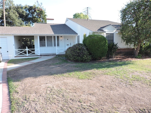 ranch-style home with a front yard