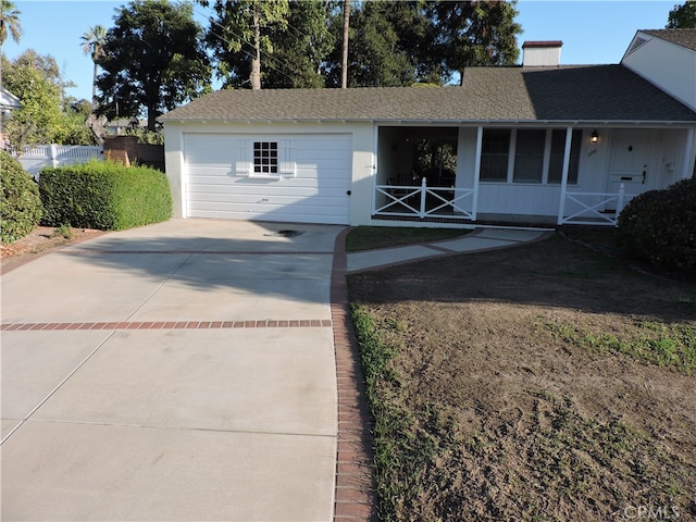 view of front of home featuring a garage