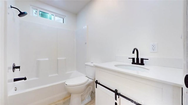 bathroom with toilet, shower / tub combination, and vanity