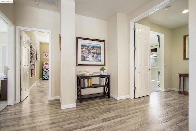 hall featuring light wood-type flooring