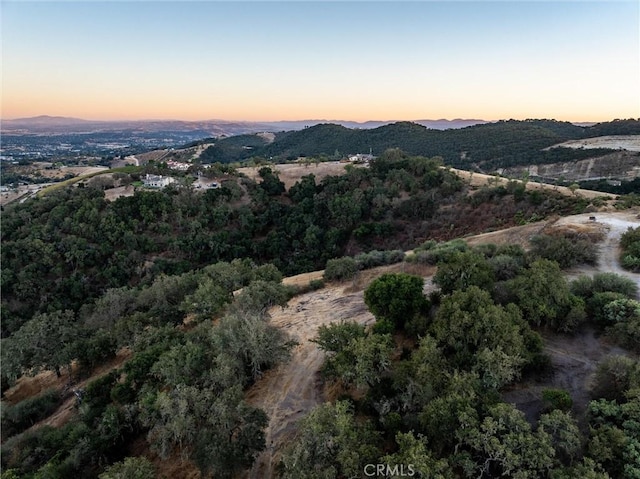 aerial view at dusk with a mountain view