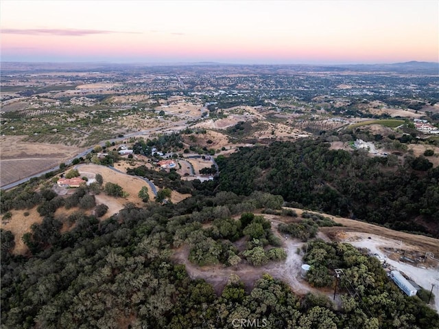 view of aerial view at dusk