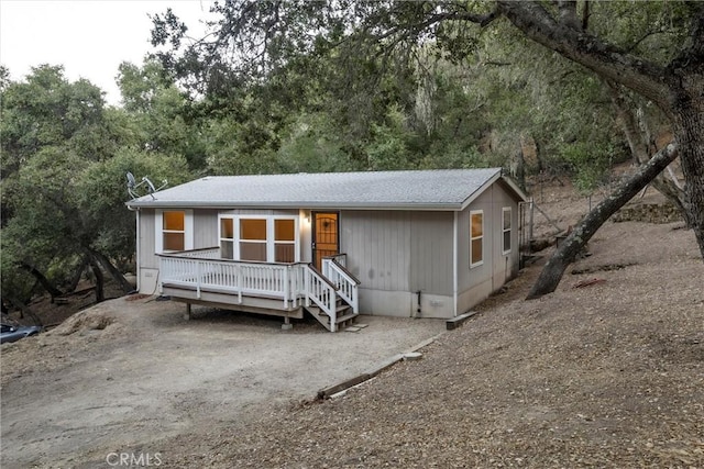 view of front of property with a deck