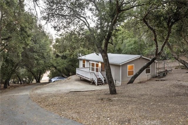 view of front of home with a deck