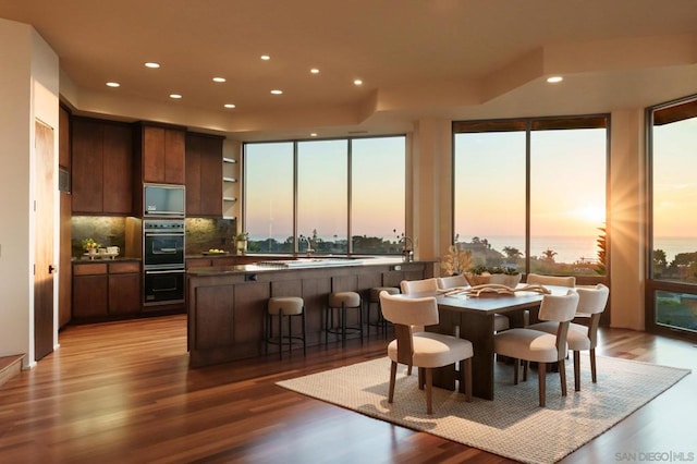 dining space featuring light hardwood / wood-style flooring