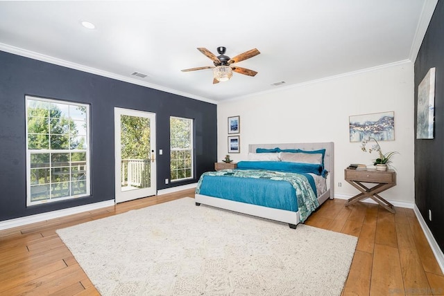 bedroom featuring hardwood / wood-style flooring, crown molding, access to outside, and ceiling fan