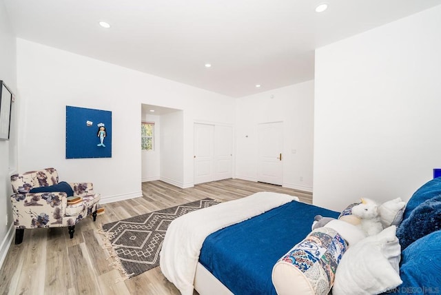 bedroom with wood-type flooring