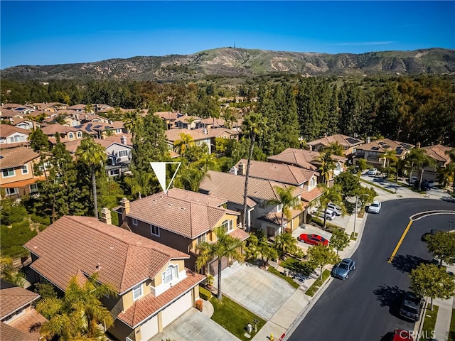 bird's eye view with a mountain view and a residential view