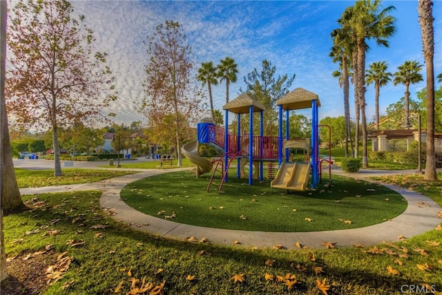 community playground featuring a yard