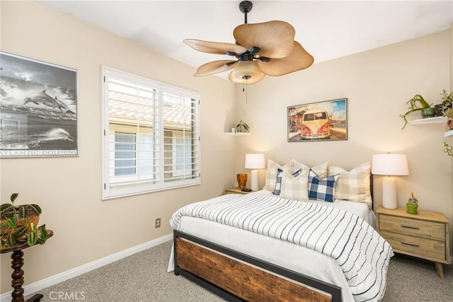 bedroom with carpet flooring and baseboards