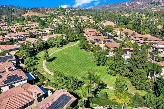 bird's eye view with a residential view and a mountain view