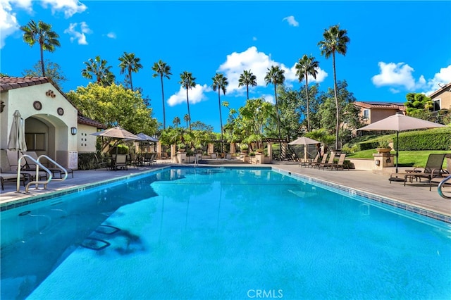community pool featuring a patio