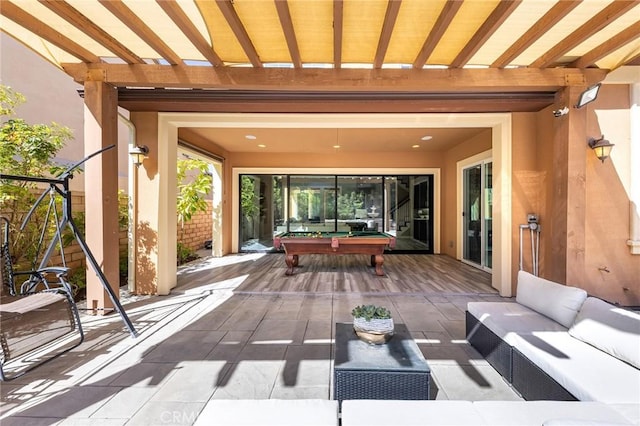 view of patio / terrace with a pergola and an outdoor hangout area