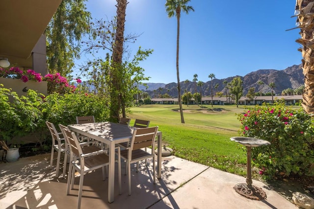 view of patio / terrace featuring a mountain view