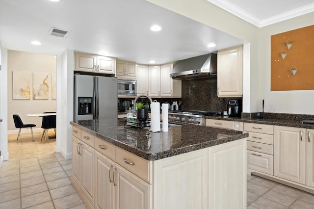 kitchen featuring tasteful backsplash, a kitchen island, crown molding, wall chimney exhaust hood, and stainless steel appliances