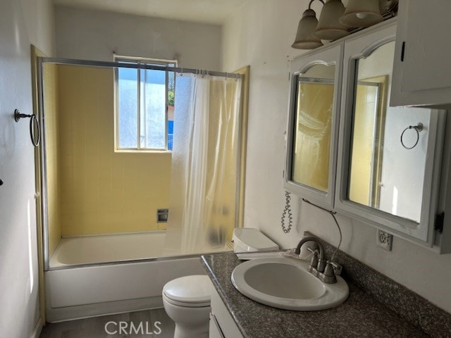 full bathroom with vanity, shower / bath combination with curtain, and toilet