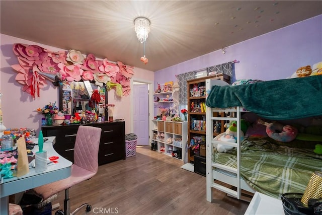 bedroom with wood-type flooring