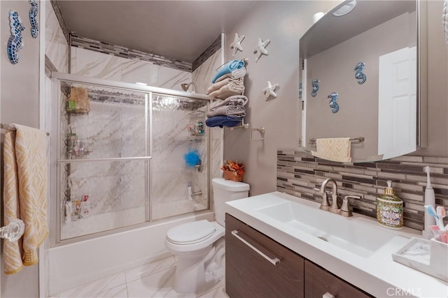 full bathroom with vanity, toilet, enclosed tub / shower combo, and backsplash