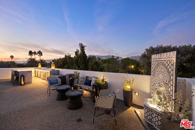 patio terrace at dusk with sink