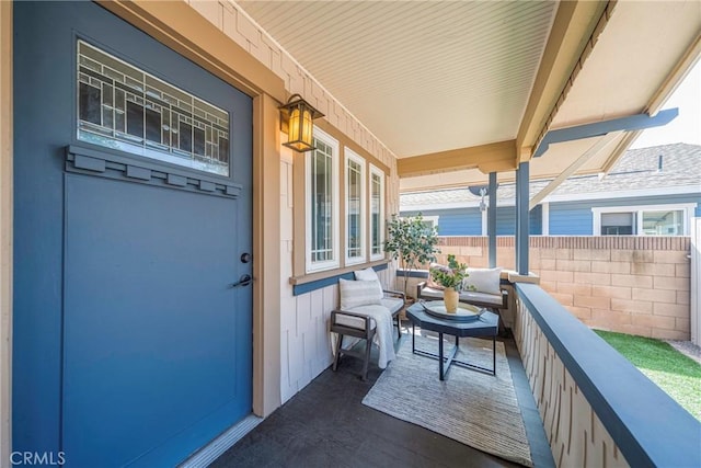 balcony featuring covered porch