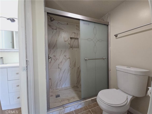 bathroom with toilet, tile patterned flooring, and walk in shower