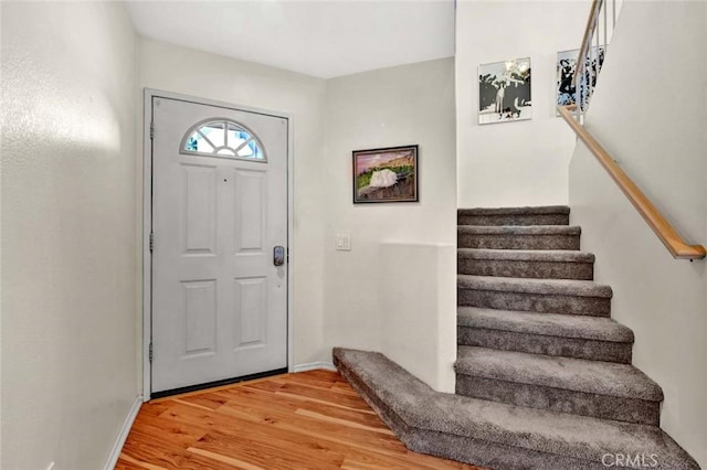 foyer entrance featuring hardwood / wood-style flooring