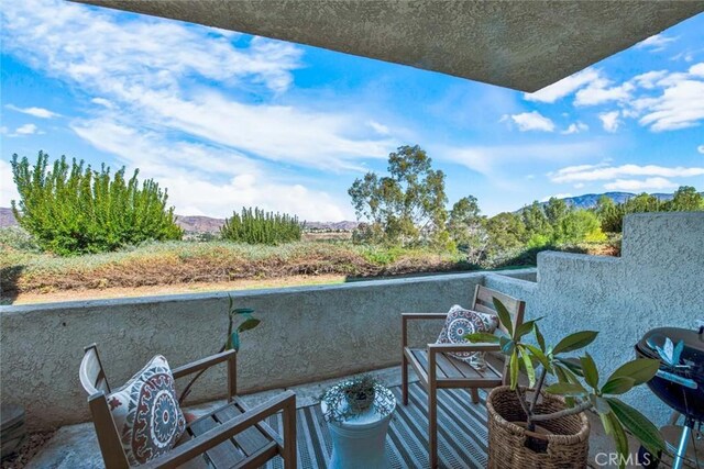 balcony with a mountain view