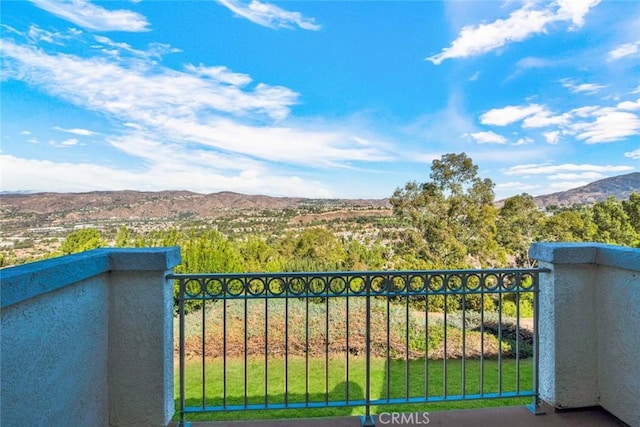 view of gate with a mountain view