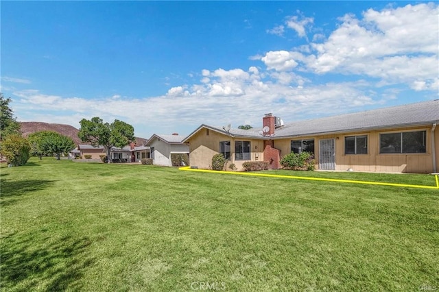 single story home with a front yard