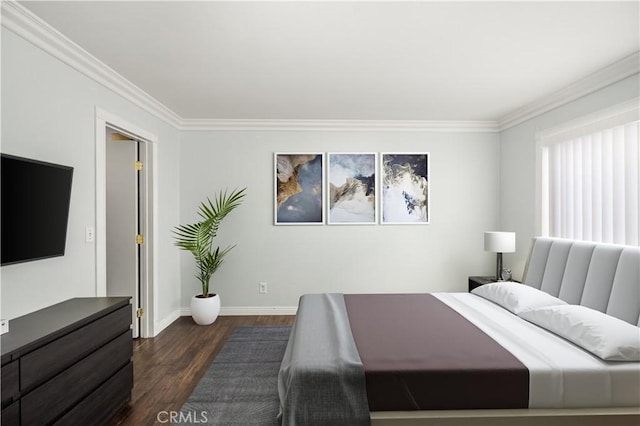 bedroom with dark hardwood / wood-style flooring and ornamental molding