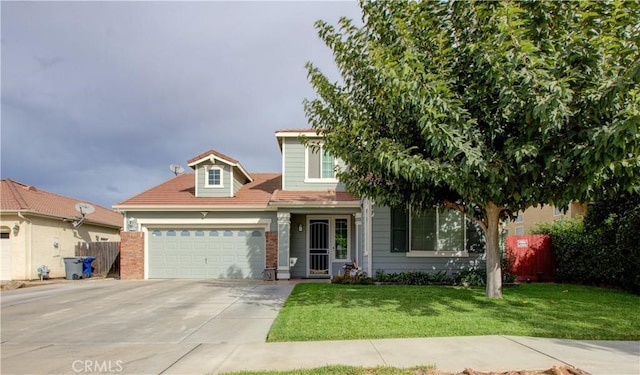 view of front of property featuring a garage and a front lawn