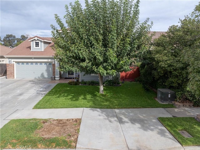 obstructed view of property with a front yard