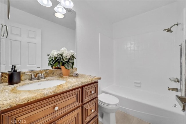 full bathroom with tile patterned flooring, vanity, toilet, and tub / shower combination