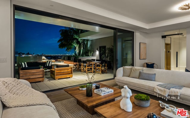 living room with light hardwood / wood-style flooring