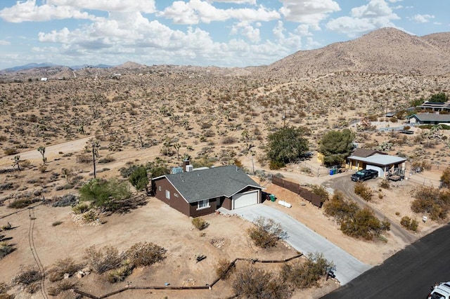 drone / aerial view featuring a mountain view