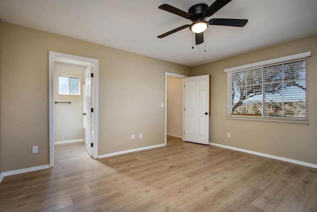 unfurnished bedroom featuring ceiling fan and light hardwood / wood-style flooring